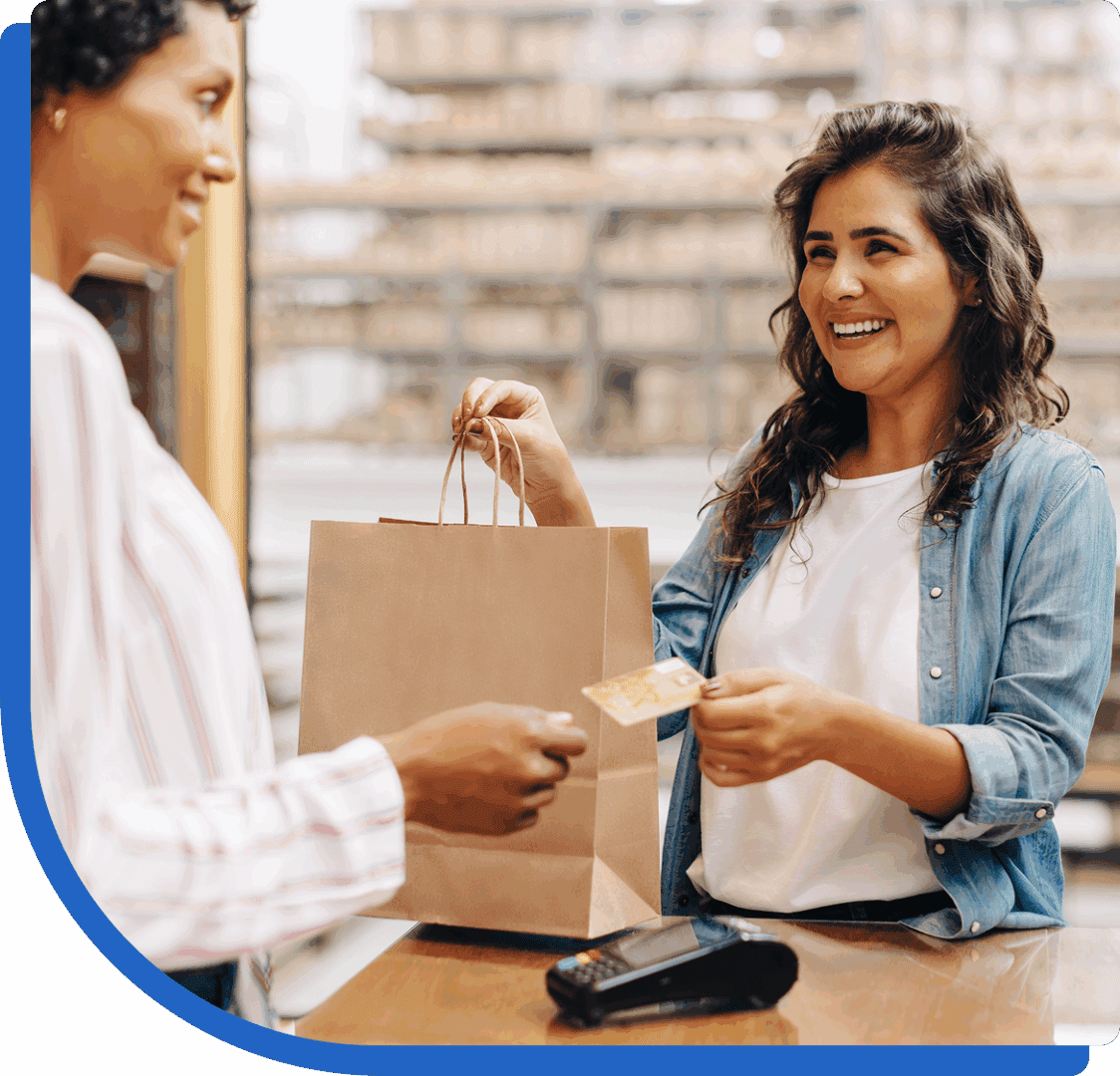 Woman paying for shopping with card.
