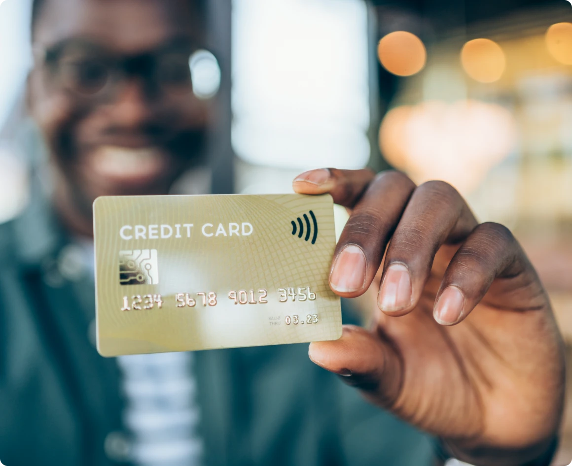 Close-up of hand with credit card