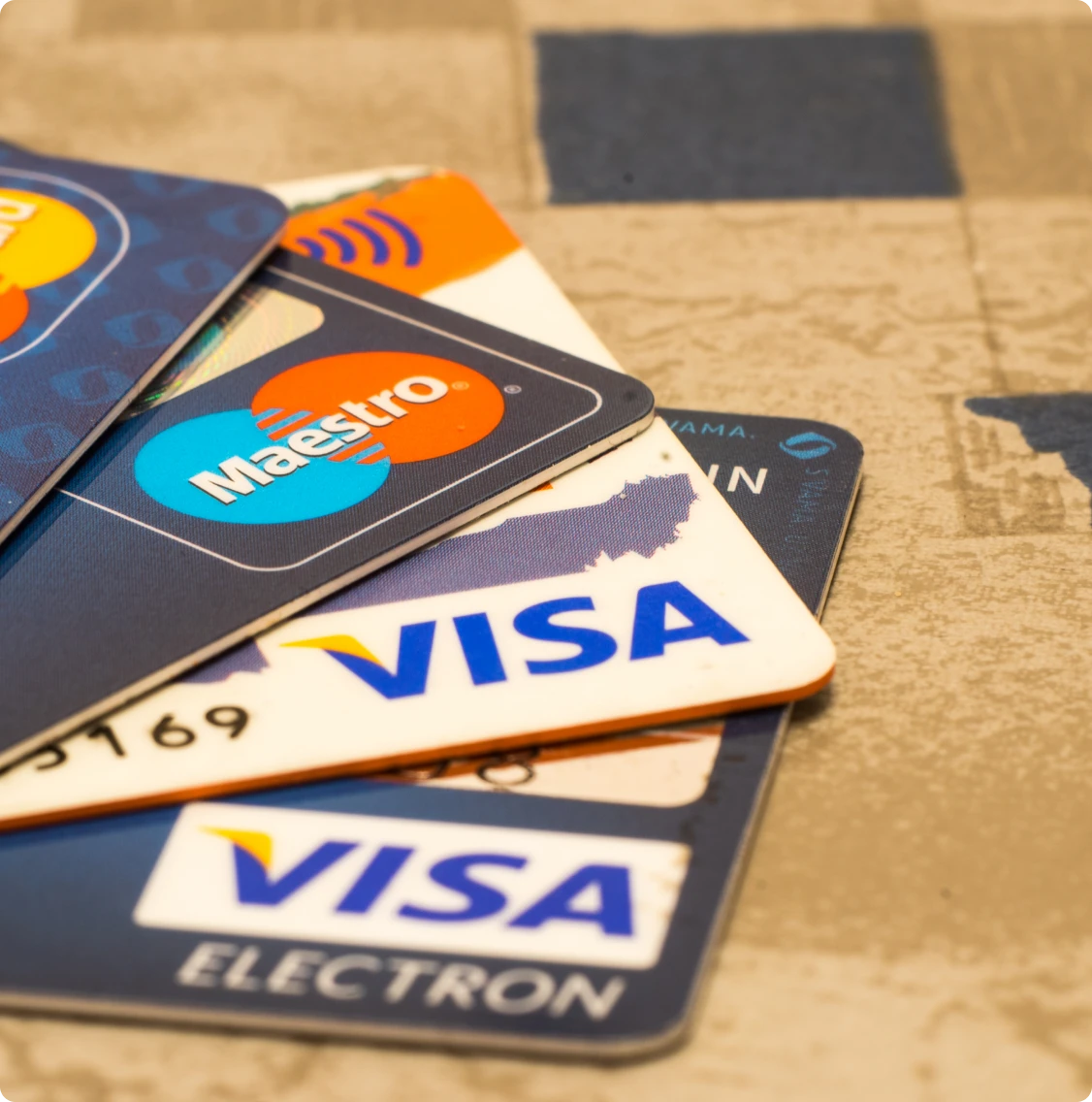 Credit cards stacked on table